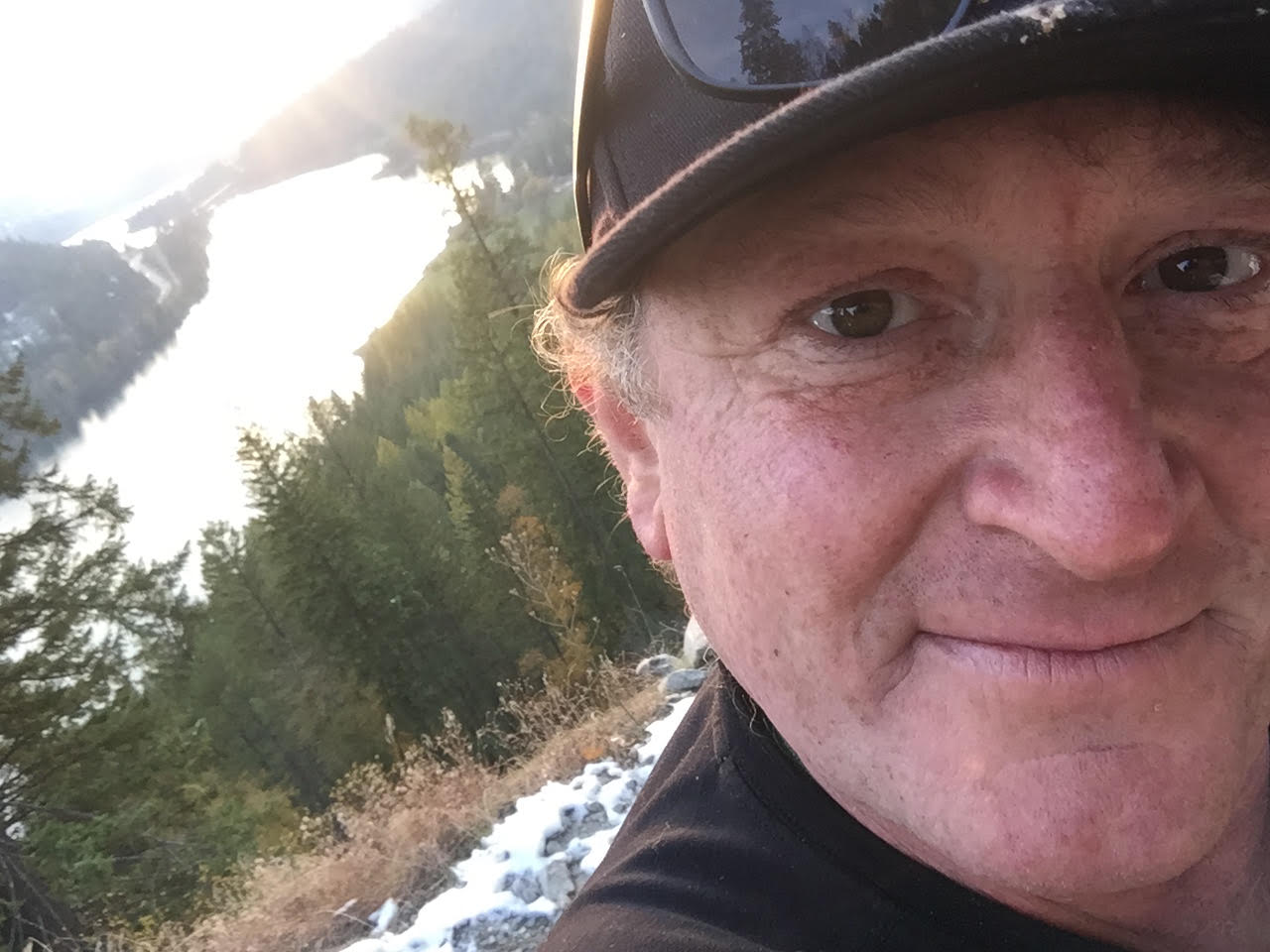 David Johnston overlooking a mountain lake